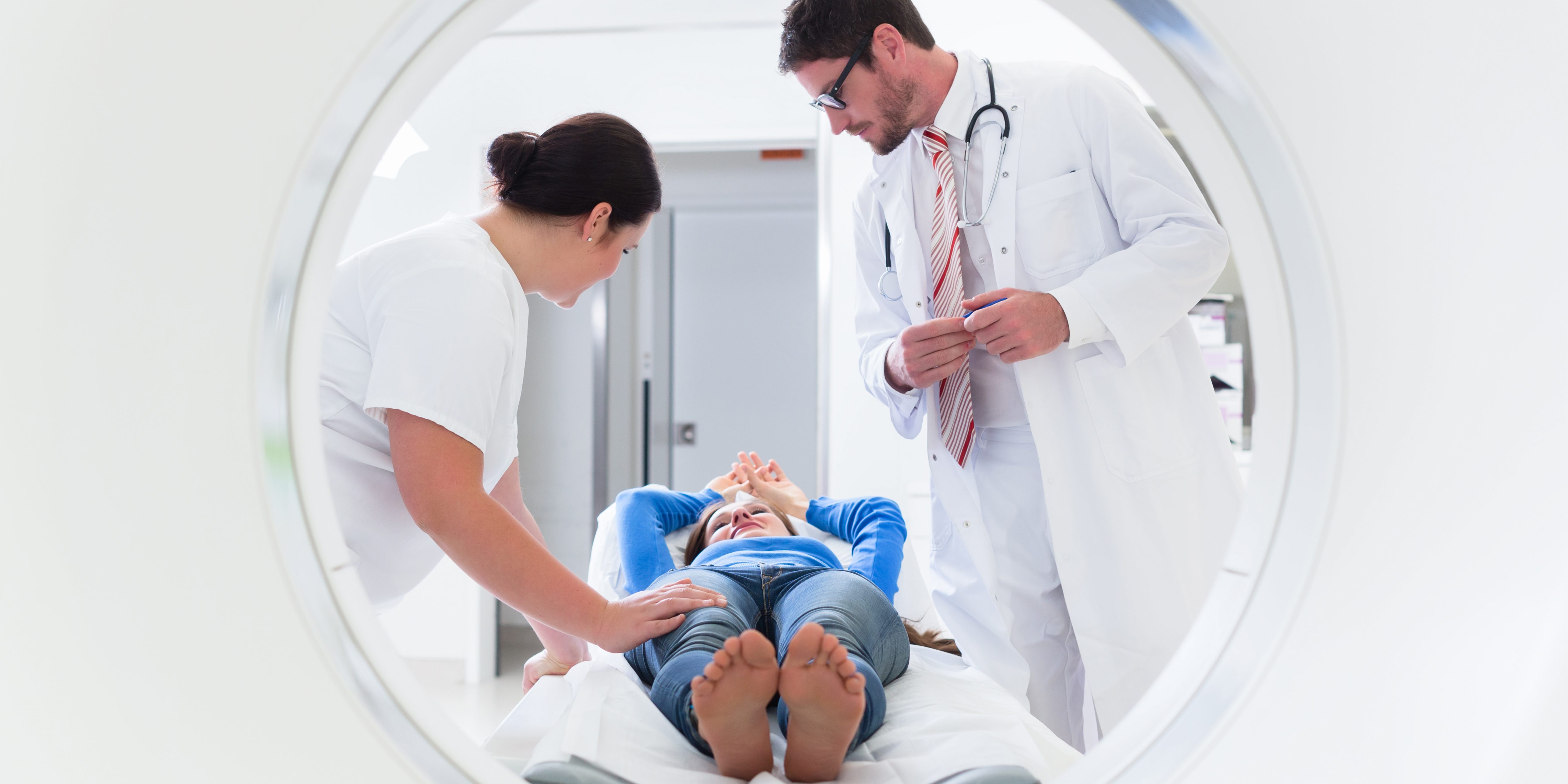 Doctor, nurse, and patient at CT scan
