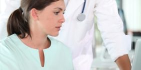 closeup of doctor and nurses in a meeting